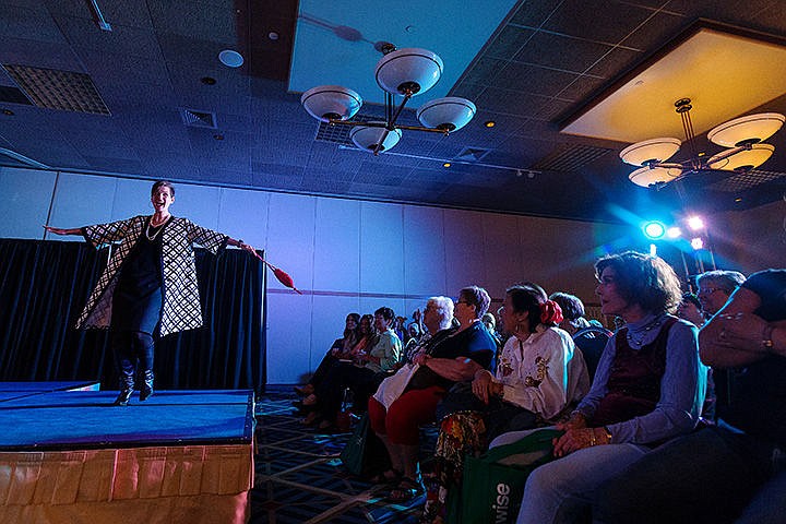 &lt;p&gt;SHAWN GUST/Press&lt;/p&gt;&lt;p&gt;Laurie Whitcomb, human resources director for Hospice of North Idaho, models clothing from the organization&#146;s thrift store during a fashion show as part of the third annual Celebrations Expo Tuesday at the Coeur d&#146;Alene Resort.&lt;/p&gt;