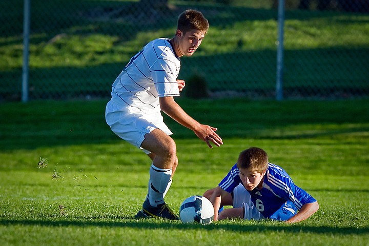 &lt;p&gt;Lake City High's T.J. Merwin turns upfield to get to a ball after Kevin Hampson from Coeur d'Alene High lost his footing.&lt;/p&gt;