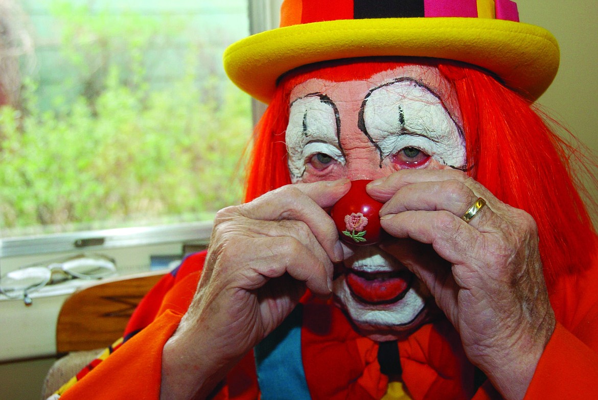 &lt;p&gt;In this March 29, 2012, file photo, Floyd &#147;Creeky&#148; Creekmore puts on his nose while getting dressed before a visit with children at a circus in Billings. Creekmore, the world&#146;s oldest clown, died Saturday night of complications from heart disease at his home in Billings. He was 98.&#160; (AP Photo)&lt;/p&gt;