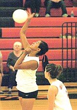 Ronan senior Alice Van Guten attacks the ball for the Maidens in their match against Polson on Saturday in Ronan.