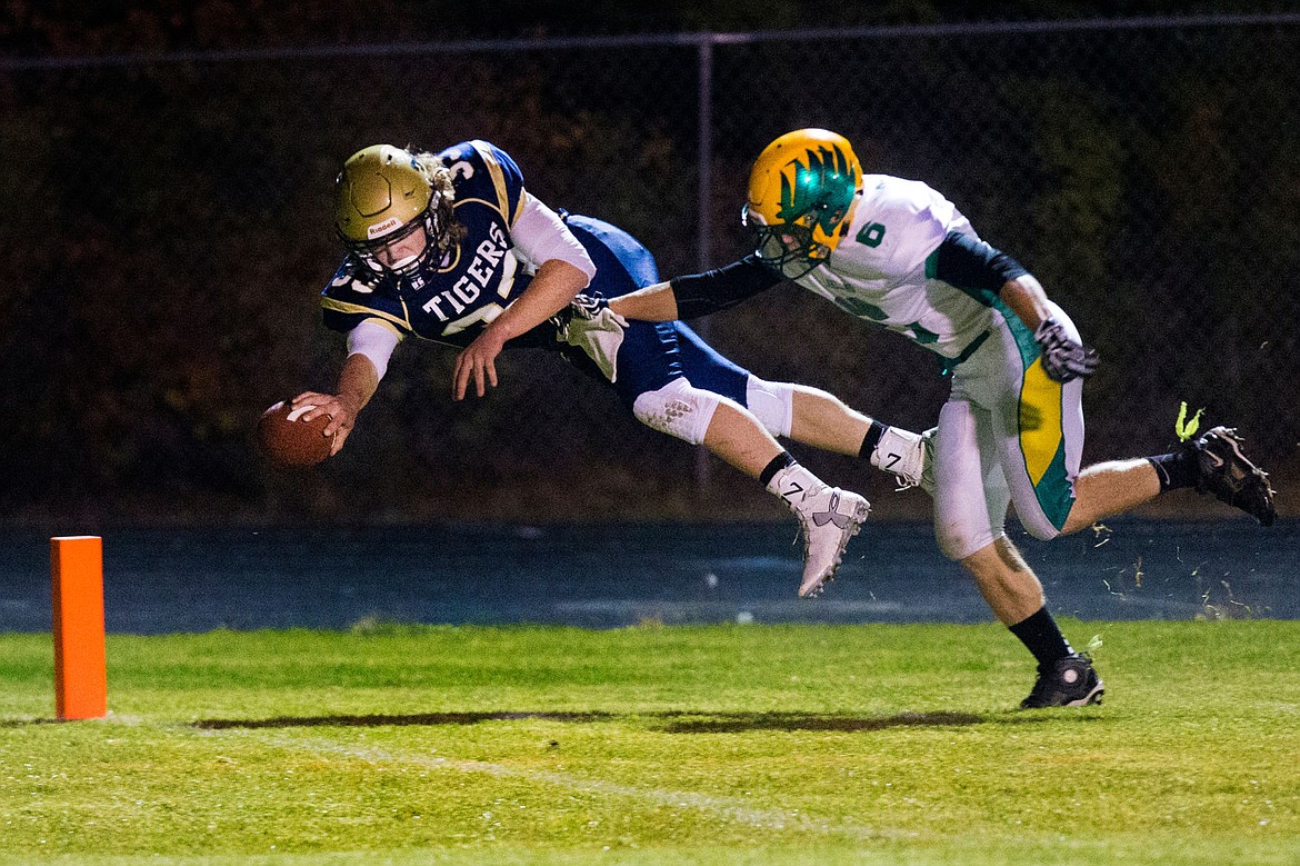 &lt;p&gt;JAKE PARRISH/Press Timberlake's Brandon Hausladen lays out for a touchdown past Ryan Pote of Lakeland on Friday at Timberlake HIgh School.&lt;/p&gt;