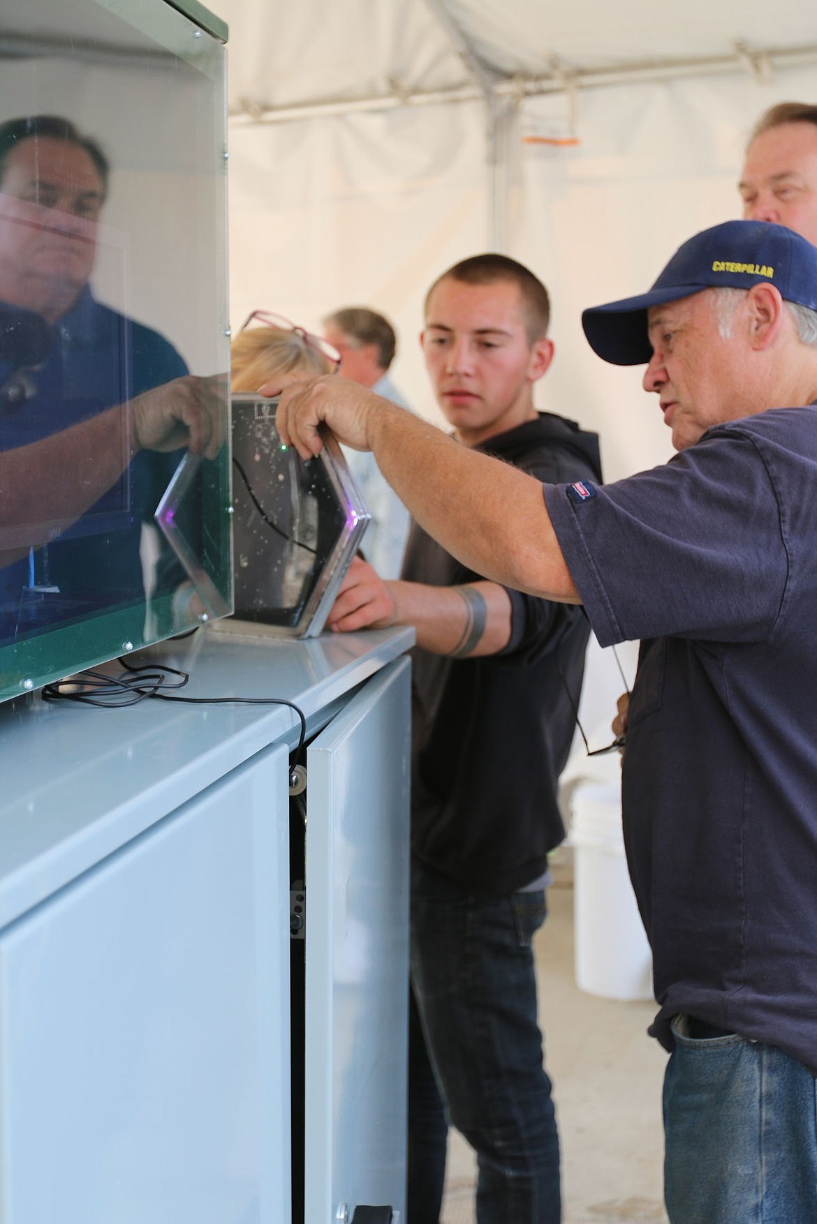 &lt;p&gt;A pair of Bonner County residents check out a demonstration panel at Friday&#146;s Solar Roadways event.&lt;/p&gt;