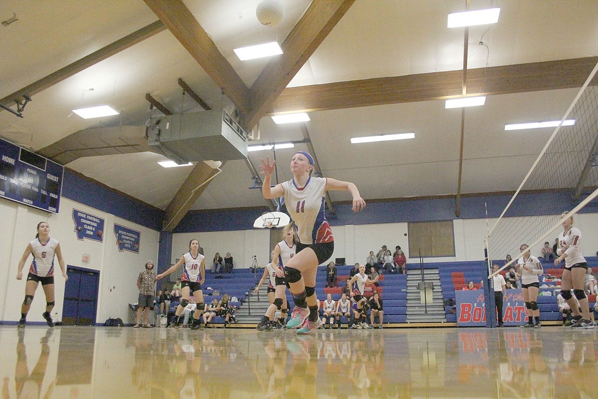 <p>Superior Lady Bobcat McKenzie Stager chases a loose ball during the team's match against Philipsburg last weekend.</p>