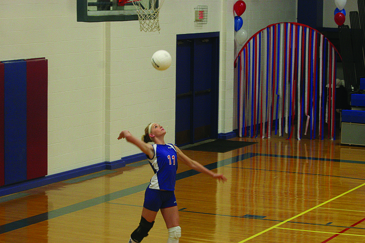 Kelsey Stenberg serves for Superior during homecoming week. The Lady Cats won, beating the county rival the St. Regis Tigers.