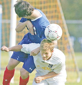 &lt;p&gt;Columbia Falls' Chase Ramberg competes with Jason Schnackenberg for a header in second half.&lt;/p&gt;