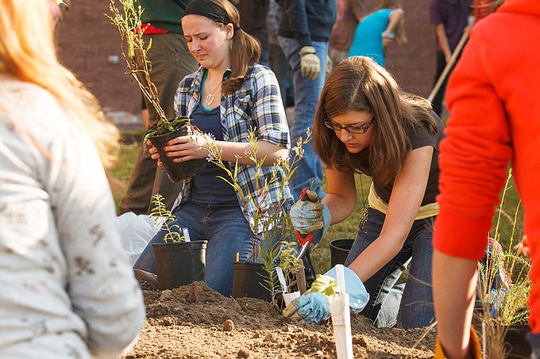 &lt;p&gt;Patrick Cote/Daily Inter Lake Several Glacier High School students including Anika Fritz, right, and Katie Christensen, both freshman, build plant beds around the school filled with native plants on Thursday morning. Thursday, Sept. 27, 2012 in Kalispell, Montana.&lt;/p&gt;