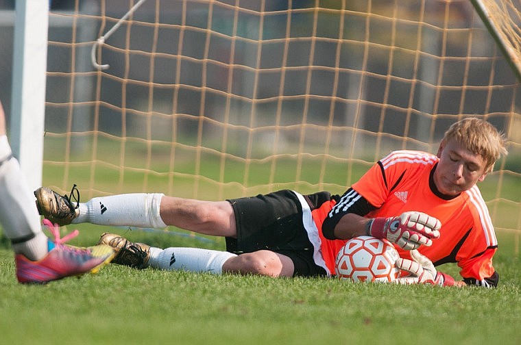 &lt;p&gt;Flathead Braves goal keeper Clark Seaman makes a diving save Monday afternoon during Western AA soccer action with Missoula Big Sky at Kidsports Complex.&lt;/p&gt;