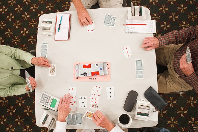 &lt;p&gt;Clockwise from top, Jaye Smith, Bob Maro, Marguerite Smith and Sarah Maro compete Wednesday afternoon during the Glacier Regional Bridge Tournament at the Hilton Garden Inn in Kalispell.&lt;/p&gt;