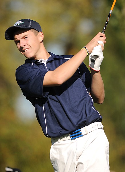 Glacier's Logan Iverson tees off during day one of the Class AA state tournament on Friday at Buffalo Hills Golf Course in Kalispell.