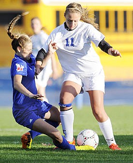 <p>Columbia Falls Ashley Miller and Bigfork's Ceciley Taylor battle for a ball during an 0-0 draw in Columbia Falls Thursday. (Aaric Bryan/Daily Inter Lake)</p>