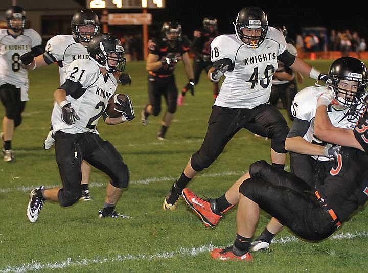 Luis Garcia, 21, looks for daylight around some crushing blocks against Zillah.