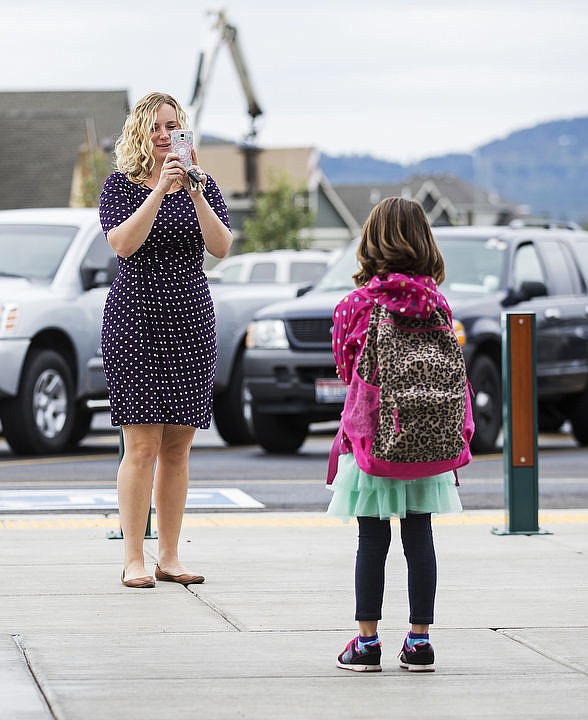 &lt;p&gt;Rachel Zender, left, takes a picture of her daughter, Hazel Zender, 6, in front of Greensferry Elementary School on Sept. 6, 2016 prior to the first day of school.&#160;&lt;/p&gt;