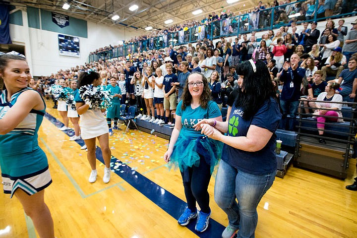 &lt;p&gt;Lake City High School student Mikayla Nicodemus is walked out to the school's basketball court by her mother Jodi Rhoden after it was announced Mikayla was granted her wish of going to Disney Land by the Make a Wish Foundation during a spirit assembly on Friday, Sept. 30, 2016. Mikayla, 18, is diagnosed Phelan-McDermid Syndrome, Lymphedema, Thyroid Disease, seizures, and kidney failure in her only existing kidney.&lt;/p&gt;