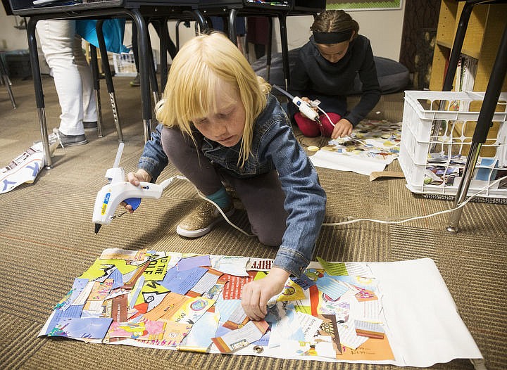 &lt;p&gt;Greensferry Elementary School third-grader Shantaya Esler, front, and Sorensen fifth-grader Elliana Rietze place paper clippings onto their skirts made of recycled banners after school on Wednesday, Sept. 21, 2016 in preparation for this year's Junk2Funk Trashion Show in October.&lt;/p&gt;