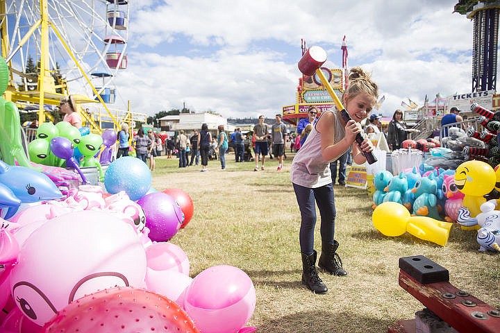 &lt;p&gt;Lyssa Watkins, 7, swings a sledgehammer as she tries to ring the hammer bell on Saturday, Sept. 3, 2016 at Paul Bunyan Days in St. Maries.&#160;&lt;/p&gt;