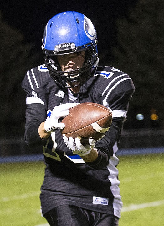 &lt;p&gt;Brody Lundblad catches a deep pass from Coeur d'Alene High quarterback Cole Yankoff on Sept. 23, 2016 against Camas High School.&lt;/p&gt;