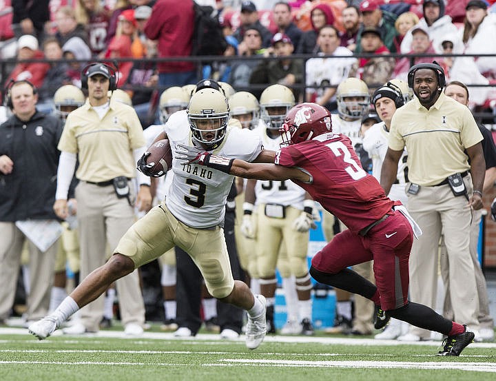 &lt;p&gt;Idaho Vandal wide receiver Deon Watson (3) stiff arms Darrin Molton as he heads downfield along the sideline. Watson, a Coeur d'Alene High School graduate, caught six passes for 62 yards.&lt;/p&gt;