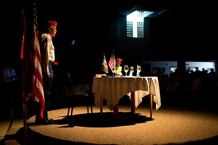 &lt;p&gt;Retired Lt. Col. Jim Mangan of the United States Marines looks over the Fallen Comrade and Missing Man Table on Friday, Sept. 16, 2016 at the National Day of Remembrance ceremony at Christ the King Lutheran Church in Coeur d'Alene. The table represents American military men and women killed or gone missing in combat.&lt;/p&gt;