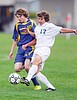 Depleted boys soccer team edged by Libby