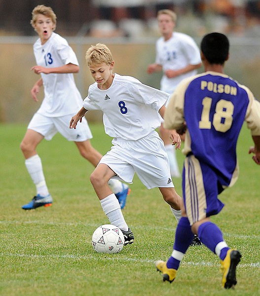 <p>Stillwater freshman Schuylar Kauffman, 8, moves the ball down
the field during the game against Polson on Tuesday evening in
Kalispell.</p>