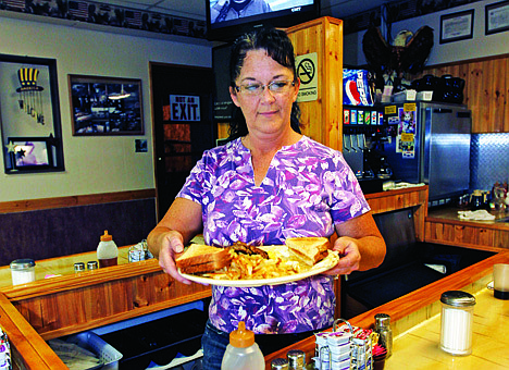 &lt;p&gt;FILE-In this Thursday, Sept. 27, 2012, file photo, Millie Brown, a cook and waitress at Buch's truck stop, serves a breakfast, in Steubenville, Ohio. U.S. service companies, which employ nearly 90 percent of the work force, grew in September at the fastest pace since March. The growth was driven by sharp increases in current and future sales. The Institute for Supply Management said Wednesday, Oct. 3, 2012, that its index of non-manufacturing activity rose to 55.1, up from 53.7 in August. (AP Photo/Keith Srakocic, File)&lt;/p&gt;