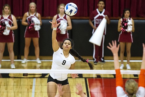 &lt;p&gt;LeeNell Hernandez jumps to spike the ball over the net to awaiting Snow College players Thursday night.&lt;/p&gt;