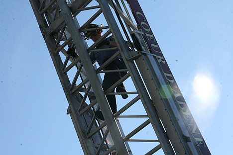 &lt;p&gt;Coeur d'Alene firefighter Josh Sutherland descends a fire ladder during an open house at Station 1 on Saturday. In celebration of Fire Prevention Week, the department hosts an open house every October.&lt;/p&gt;