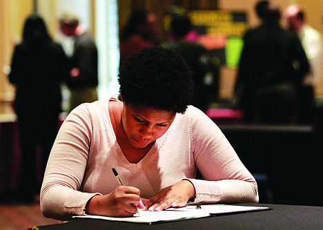 &lt;p&gt;In this Wednesday, Oct. 3, 2012, photo, job hunter Bessie Soley, of Locust Grove, Ga., files out an application at the National Job Fair in Atlanta. The number of Americans seeking unemployment benefits rose to a seasonally adjusted 367,000, a level consistent with only modest hiring on Thursday, Oct. 4, 2012. The Labor Department says applications increased last week by 4,000 from the previous week's level of 363,000. (AP Photo/John Bazemore)&lt;/p&gt;