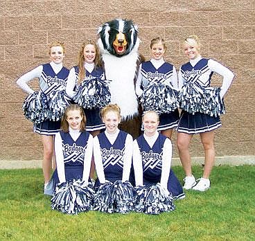 &#151;Courtesy Photo The Bonners Ferry High School varsity cheerleaders. Top Row: Whitney Booth, Holly Robertson, Badger Buddy, Heather DelCarlo, Kristina Turpin. Kneeling: Erin Barker, Miryka Stippich, Tiffany Worley