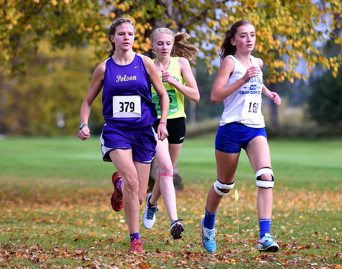 &lt;p&gt;Columbia Falls' Kimberly Peacock tries to distance herself from Polson's Beatrix Frissell and Whitefish's Braya Hobson during the Whitefish Invitational at the Whitefish Lake Golf Club on Thursday. Peacock won the race with a time of 18:19. (Aaric Bryan/Daily Inter Lake)&lt;/p&gt;