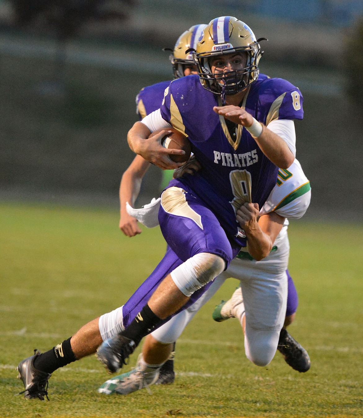 &lt;p&gt;&lt;strong&gt;POLSON PIRATES QB Tanner Wilson&lt;/strong&gt; eyes the end zone early in the first quarter in Friday&#146;s 38-0 homecoming victory Friday at Polson High School. (Jason Blasco/Lake County Leader)&lt;/p&gt;