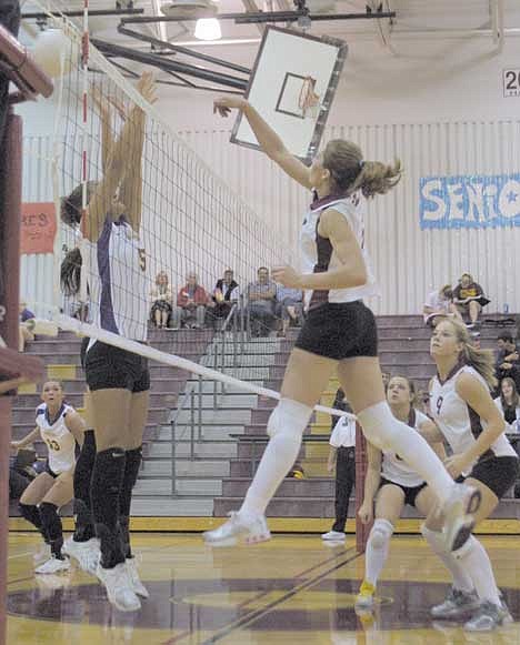 CUTLINE: Chiefs' outside-hitter Sarah Kast gets a kill in the second game in Moses Lake Tuesday night. The Chiefs lost in three games, but the game marked Kast's return from injury.