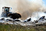 Trailer full of straw catches fire