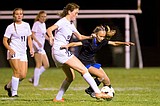 Rieken lifts Lake City girls to fourth straight league title