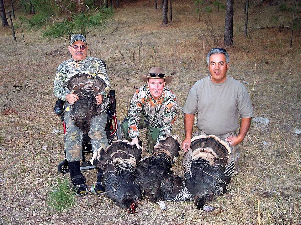 The Hut Crew, left to right, Jerry Lester, Thomas Steffens and Lani Schorzman, with a limit of Turkeys from the Colville area. Jerry was using a motorized chair at this time and able to participate in the hunts from a portable blind.