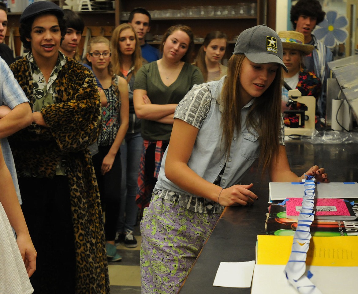 &lt;p&gt;&lt;strong&gt;Grace Cady&lt;/strong&gt; drops a marble in the contraption she built during the Montana Outreach tour at Flathead HIgh School on Thursday. Professors from the University of Montana taught classes at Glacier and Flathead. (Aaric Bryan/Daily Inter Lake)&lt;/p&gt;