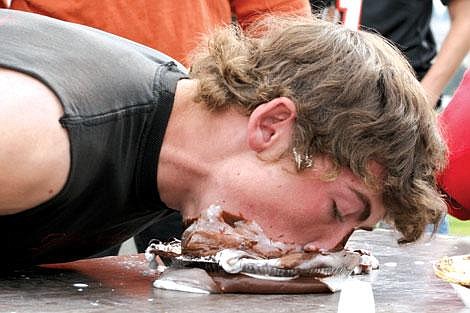 Jason Shueh/Valley Press Junior Darin Anderson stuffs his face with pie.