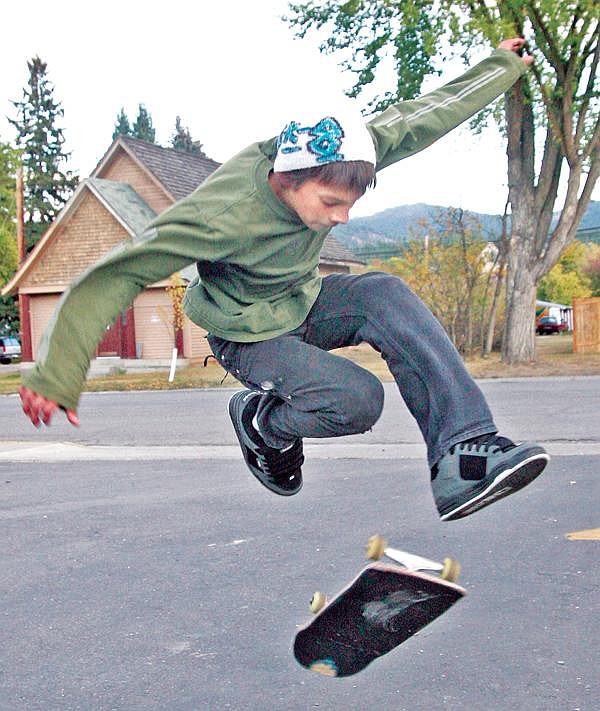 Canda Harbaugh/The Western News Marcos Castillo, 13, takes advantage of Tuesday evening&#146;s pleasant weather to practice his skills outside Central High School. He and fellow skateboarders attended Monday&#146;s Libby City Council meeting to show their support for a new skateboard park.
