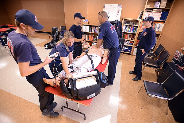 &lt;p&gt;From left, Firefighter/EMTs Brandon French, Jessica Kinzer, Doug Schwartz, Tim Gaston, and Josiah Mooney practice various medical scenarios as they prepare for their Advanced Cardiac Life Support recertification. EMTs are required to recertify every two years. Fire Prevention Week started on Sunday, October 7, and goes through the 13th. During this week the fire department will give a fire presentation to all third grade classes in the city including at Trinity Lutheran and St. Matthew's, they will be going door-to-door with information packets for residents in the south end of town, and they will be giving multiple station tours. To request a station tour call 758-7760.&lt;/p&gt;