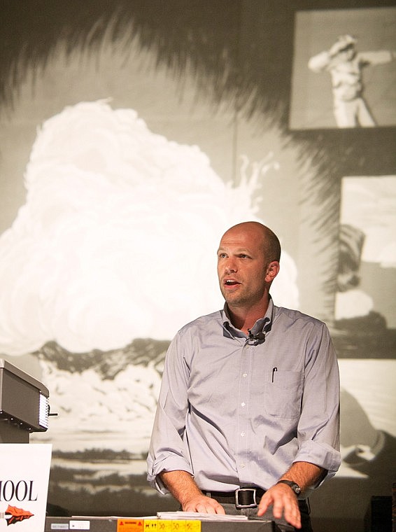 <p>Patrick Cote/Daily Inter Lake Jonathan Fetle-Vorm presents his graphic novel "Trinity" to a group of students Tuesday afternoon at Flathead High School. Fetle-Vorm's novel details the history of the atomic bomb. Tuesday, Oct. 2, 2012 in Kalispell, Montana.</p>