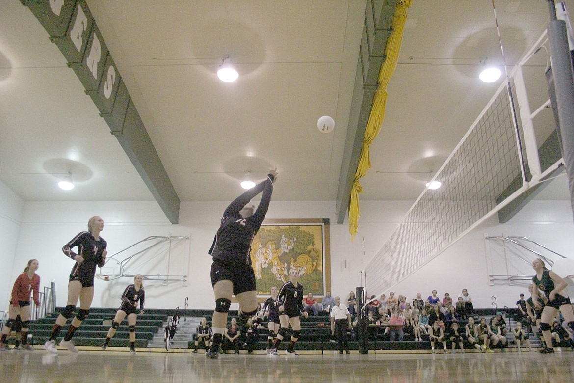 &lt;p&gt;Josey Carr sends the ball flying over the net for Hot Springs during a match last week against St. Regis.&lt;/p&gt;