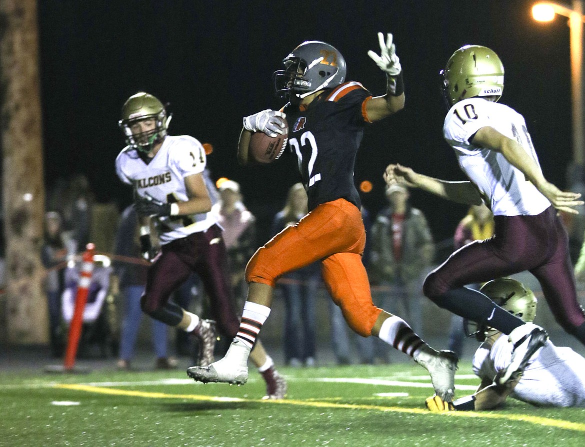 &lt;p&gt;Ronan's Ezekiel Misa dances by a few Florence defenders on Friday night during the fourth quarter.&lt;/p&gt;