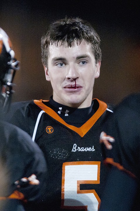 <p>Flathead senior wide receiver Matt McLean (5) scored the Braves
only touchdown and received a bloody nose and lip in the
process.</p>