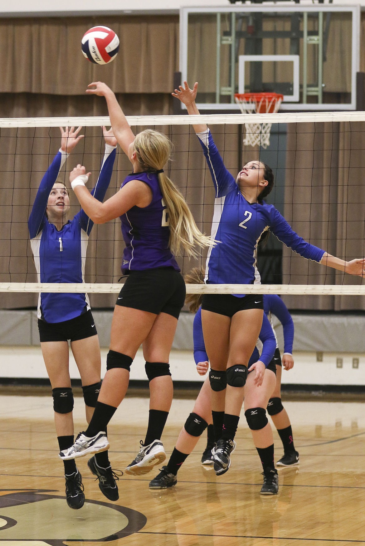 &lt;p&gt;Mission's Sydney Castor and Afton Brander try to block a tip by Charlo's Mikaylan Roylance.&lt;/p&gt;