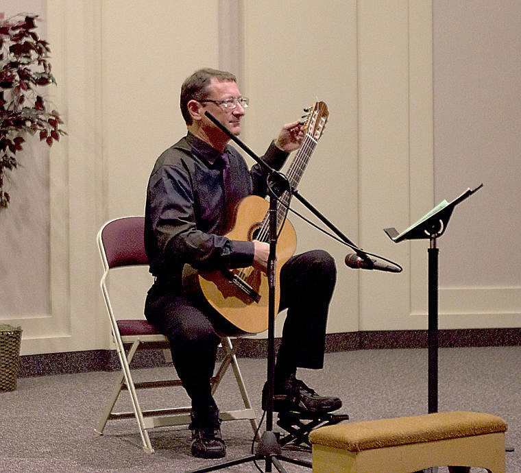 &lt;p&gt;Dr. Roger Glenn Pafford showcases his talent as he captivates the audience with his guitar playing as the Mineral County Performing Arts Council opened its 2013/2014 season at the LDS church.&lt;/p&gt;