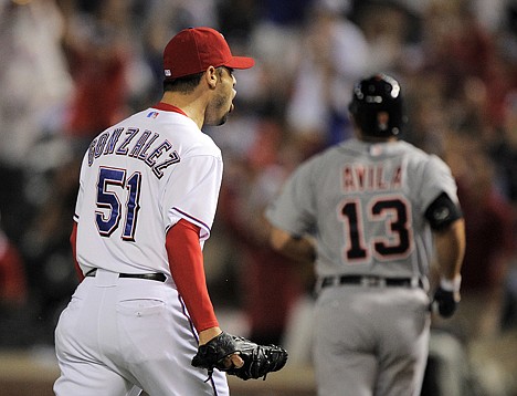 &lt;p&gt;Rangers relief pitcher Mike Gonzalez reacts after forcing a groundout from Detroit's Alex Avila to end the fifth inning during Game 1 on Saturday night at Arlington, Texas.&lt;/p&gt;