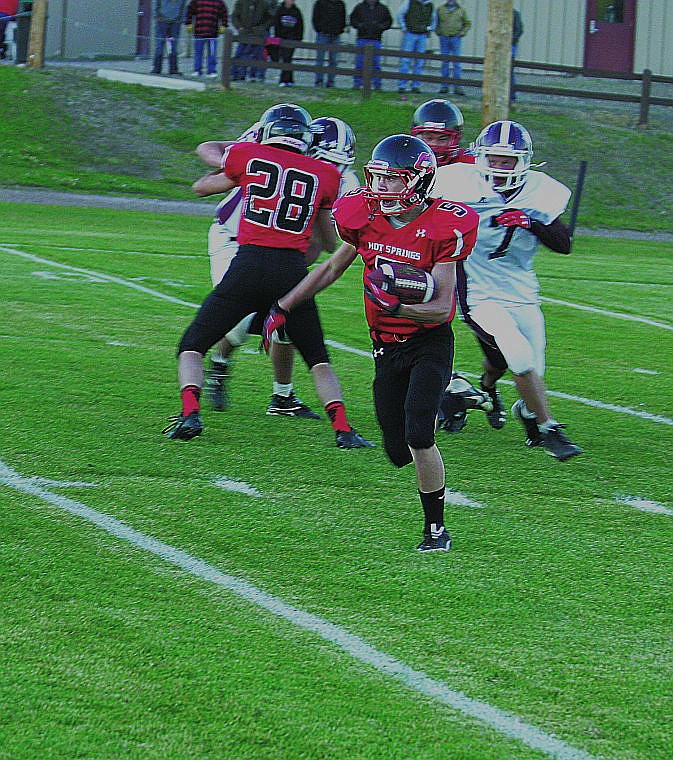 &lt;p&gt;Jarod White makes an advance down the field as Hot Springs annihilated the Bears of Lima.&lt;/p&gt;