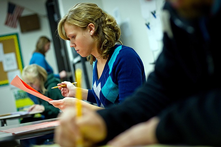 &lt;p&gt;Sara Schmoe, a second-grade teacher at Betty Kiefer Elementary, reads one of the 4,300 fall student papers that were graded Friday for the direct writing assessment. The program was eliminated by the state board of education, but Lakeland Joint School District felt writing is too important to discontinue assessing student performance and continued the program on their own.&lt;/p&gt;