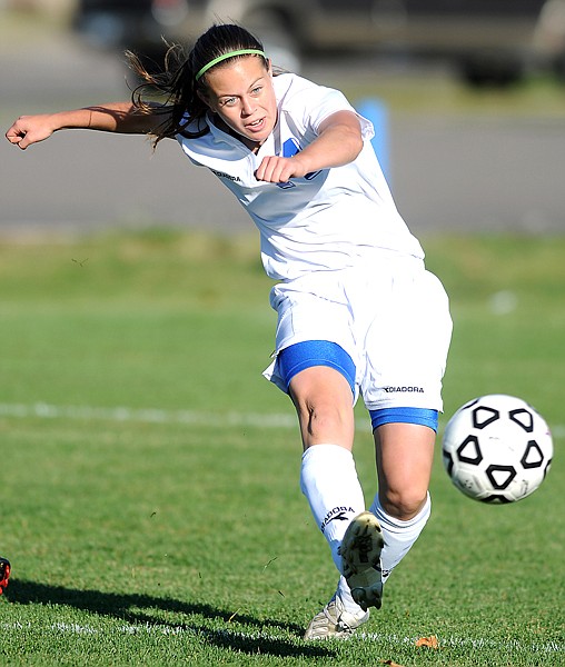 Columbia Falls junior McKenzie Kiser (14) takes a shot at the goal during the game against Frenchtown on Tuesday.