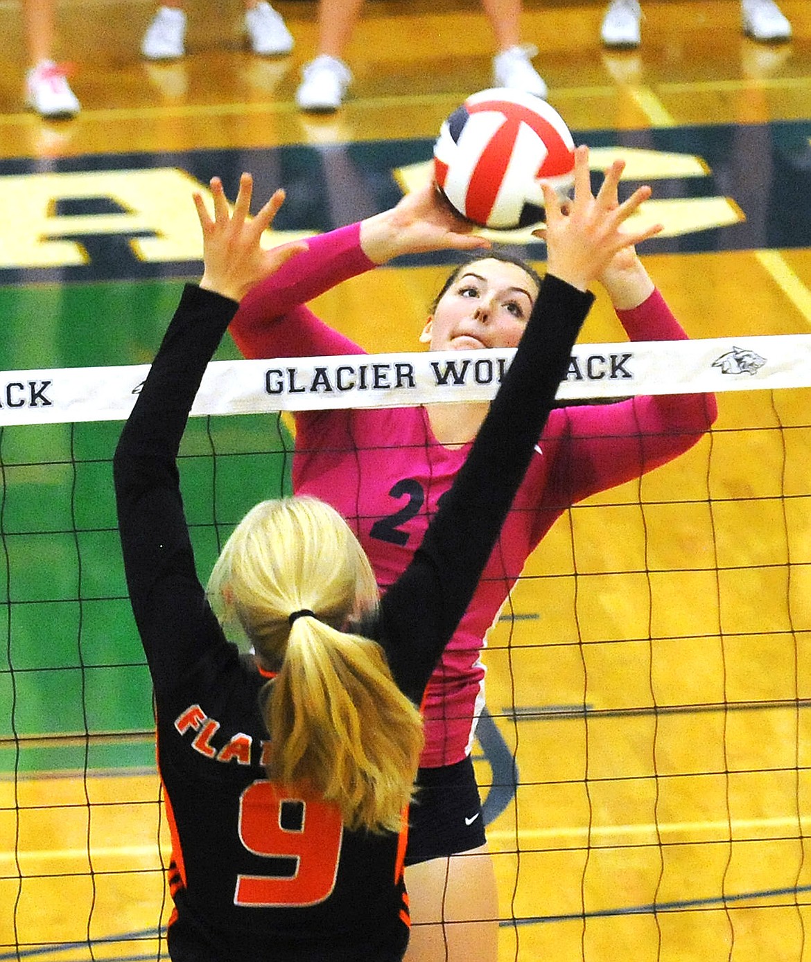 &lt;p&gt;Glacier's Nikki Krueger pushes the ball past Flathead's Tiana Johnson during the second game of the crosstown match at Glacier. (Aaric Bryan/Daily Inter Lake)&lt;/p&gt;